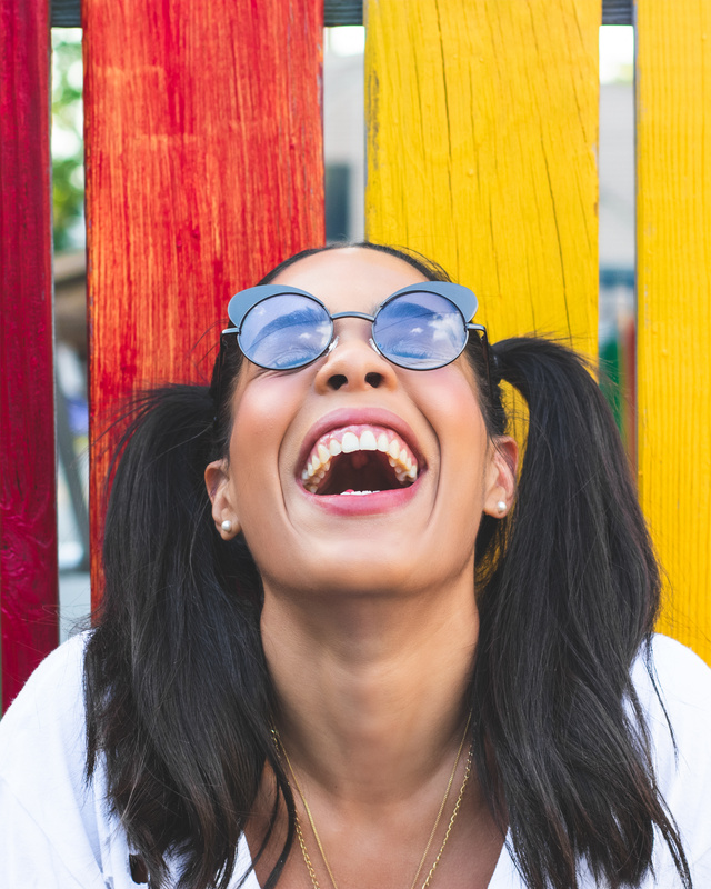 Photo of Woman Wearing Eyeglasses