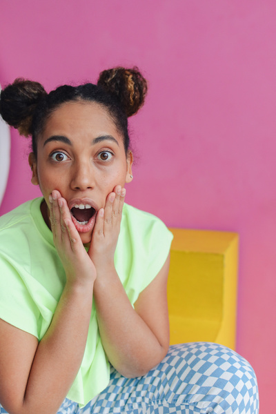 Surprised Woman in Colorful Outfit